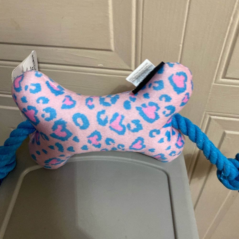 - Brand New Tahari Bone Dog Toy With Rope And Squeaker.